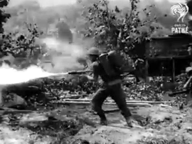 Australian soldier killing with a flame thrower