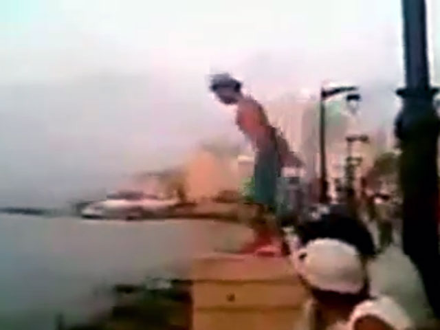 Man has terrible jump off ledge