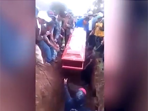 Woman's body falls out of coffin during funeral after pallbearer falls on top